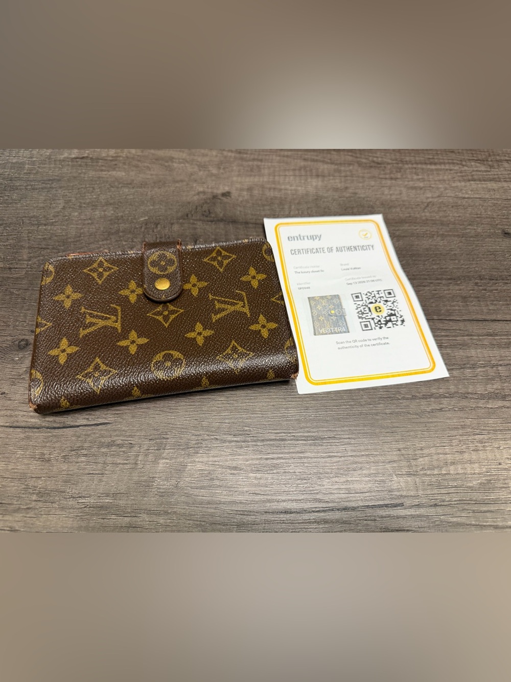 The Louis Vuitton Monogram Canvas Porte Papier Zipper Wallet w/COA
